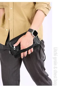 Detailansicht der schwarzen Umhängetasche aus Leder mit Lychee-Narbung und Reißverschluss