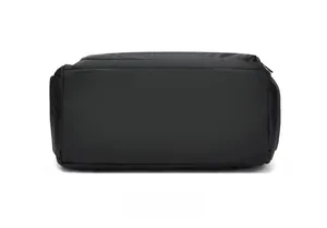 Detailed bottom view of the large black travel bag showing durable stitching and material