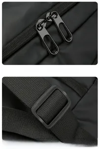 Detail of smooth dual-way metal zippers and adjustable nylon shoulder strap buckle