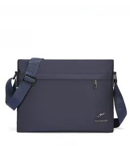 Close-up of blue oxford fabric shoulder bag with kangaroo logo and adjustable strap