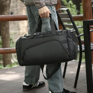Black large capacity waterproof travel duffel bag with shoulder strap for fitness and sports