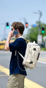 Detail view of large capacity backpack with built-in USB port and functional side buckle