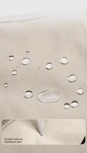 Close-up of waterproof ripstop fabric with water repellent effect for backpack