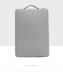 Detail view of the slim laptop sleeve back with soft fabric and hidden zippers
