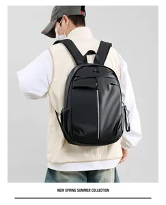 Close-up of lightweight black waterproof backpack featuring vertical zipper compartment