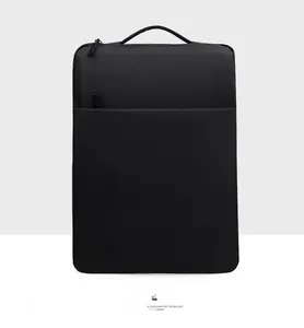 Front view of black waterproof nylon laptop sleeve with top handle and hidden zipper