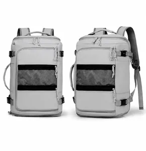Detailed view of grey travel backpack with multiple compartments and reinforced buckles