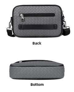 Detailansicht der grauen Flechtledertasche mit Reißverschlussfach und Bodenstruktur