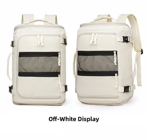 Detail view of beige multi-layer backpack with adjustable buckles and mesh pockets