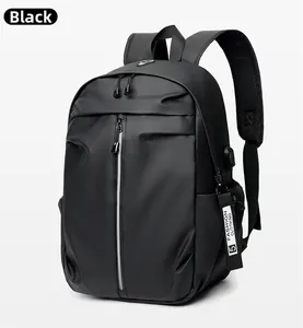 Close-up of waterproof black backpack with side USB charging port and fashion strap