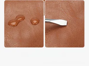 Detail of waterproof and scratch-resistant brown leather fabric on men's crossbody bag