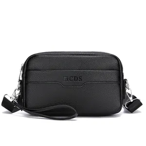 Schwarze Herren Umhängetasche aus Leder mit Lychee-Muster und verstellbarem Nylon-Schultergurt