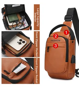 Detailed view of brown leather chest bag showing large capacity interior and USB port