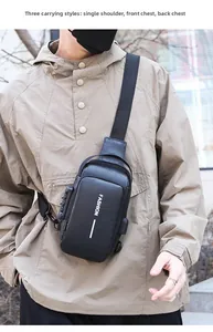 Detail view of the anti-theft combination lock and textured PU leather on a black chest bag