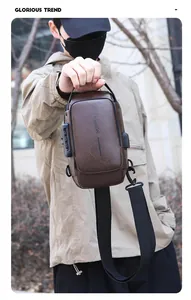 Brown PU leather chest bag detail showing anti-theft combination lock and USB charging port