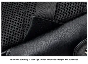 Close-up of reinforced triangle stitching on black PU leather straps for durability