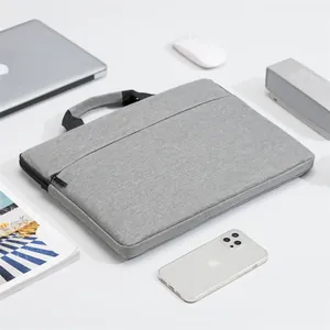 Thick light grey laptop briefcase with a spacious compartment and ergonomic black handles