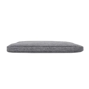 Close-up of heather grey laptop sleeve showing durable fabric texture and slim side profile