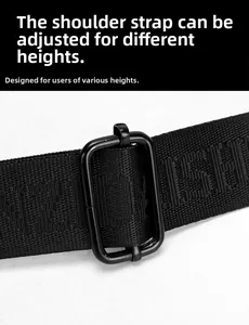 Detail of adjustable black nylon shoulder strap with matte metal buckle and textured weave