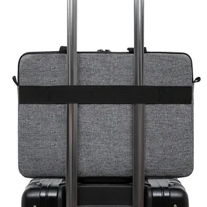 Dark grey waterproof laptop bag with back luggage strap for business travel and commuting