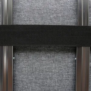 Close-up of waterproof fabric texture and durable nylon strap on laptop sleeve bag