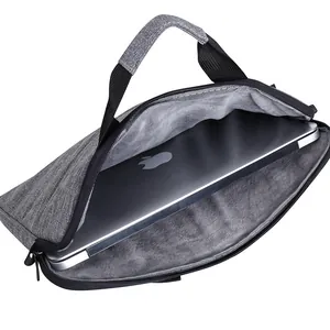 Waterproof grey laptop bag with soft velvet lining and durable top handles