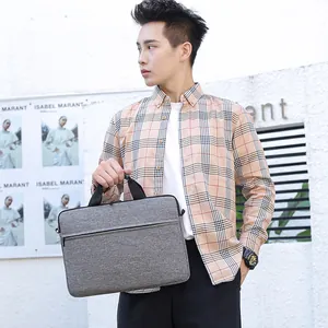 Grey minimalist laptop bag with hidden front zipper for 13-14 inch notebooks