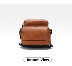 Detailed bottom view of brown leather sling bag showing neat stitching and texture