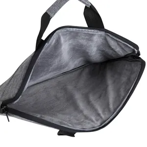 Detail of laptop bag with gray fabric texture and thick protective soft plush lining
