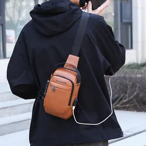 Brown leather sling bag for men with USB port and combination lock outdoor view