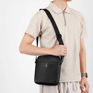 Men's black litchi pattern leather shoulder bag with adjustable embossed strap for commute
