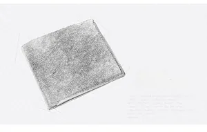 Detail view of men's bifold wallet with unique metallic silver crinkle texture finish