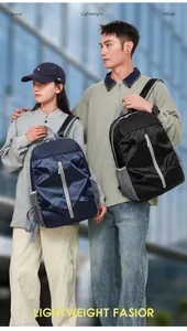 Detail of lightweight diamond lattice nylon backpacks with mesh side pockets and silver zippers