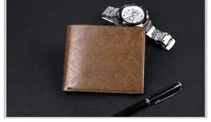 Close-up of brown leather men's wallet with refined stitching on a professional background
