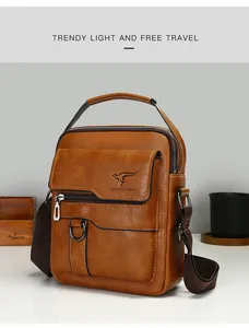 Detailed view of brown leather men's messenger bag with adjustable strap and top handle