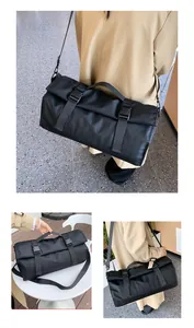 Bolsa de viaje negra de gran capacidad con correas ajustables y detalles de hebilla