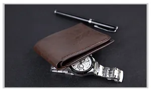 Close-up of brown leather bifold wallet featuring refined stitching and a professional style
