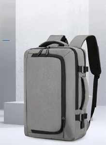 Macro shot of grey fabric texture and side buckles on the modern laptop backpack