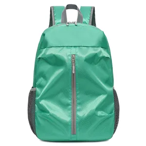 Lightweight mint green travel backpack with ripstop texture and front zipper pocket