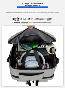 Internal structure of the gray laptop backpack showing multi-compartment storage capacity