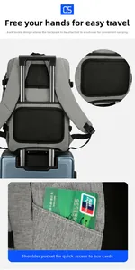 Detail of grey laptop backpack showing luggage strap and shoulder strap card pocket