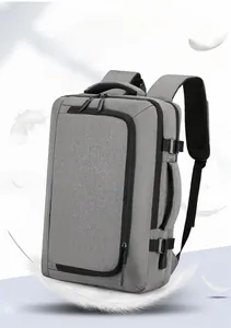 Close-up of lightweight grey laptop backpack with multi-layer zipper and side handle