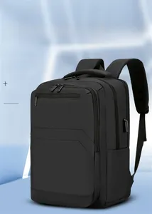 Business backpack featuring multiple compartments and external USB charging port