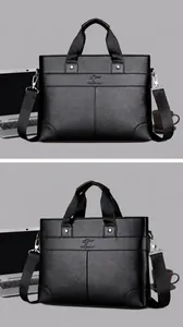 Détail d'une mallette en cuir grainé noir avec logo kangourou et bandoulière amovible