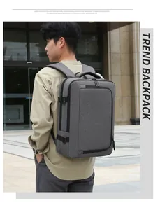 Close-up of grey laptop backpack showing durable fabric texture and side buckles