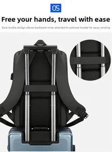 Detail of the back luggage strap on a black waterproof business backpack for travel