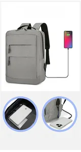 Détails du sac à dos ordinateur gris avec port USB externe et compartiment pour batterie externe