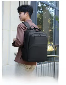 Detail view of the waterproof black business backpack with ergonomic padded shoulder straps