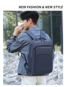 Side view of deep blue waterproof 16 inch laptop backpack for men on a model