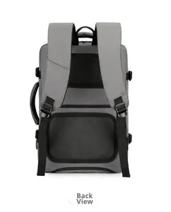 Detail view of the breathable padded mesh back and wide ergonomic straps of the gray backpack